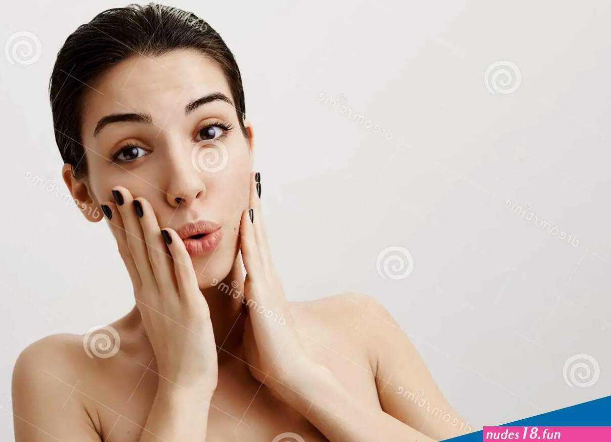 Close-up Portrait of Emotive Caucasian Female Standing Naked and with Wet Hair O