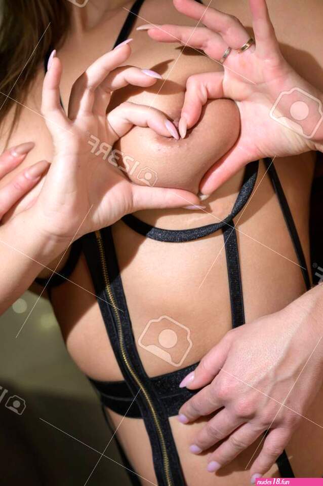 Happy Valentines Day. Two Lesbians Show Love. A Woman Hugs A Partner From The Back And Caresses Her Boobs. Heart Sign With Hands. Stock Photo Picture and Royalty Free Image. Image 158487341.