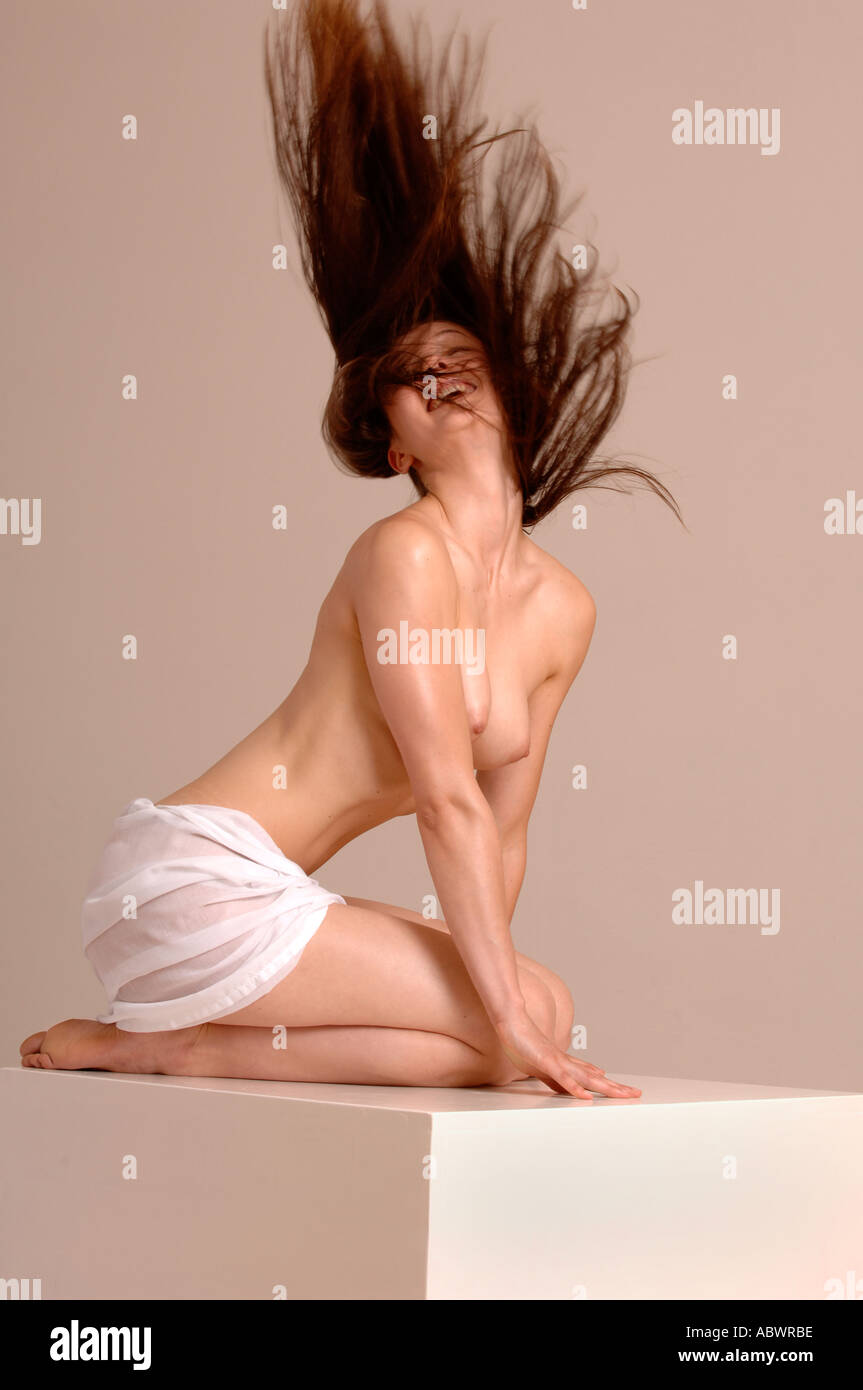 beauty model posing in the studio semi naked Stock Photo