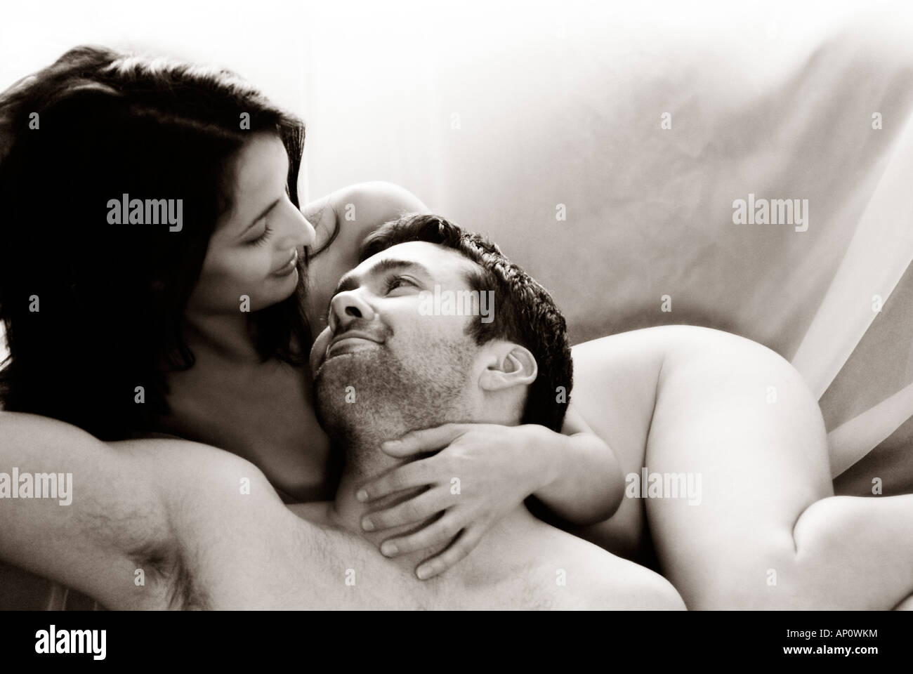 naked couple in loving contact Stock Photo