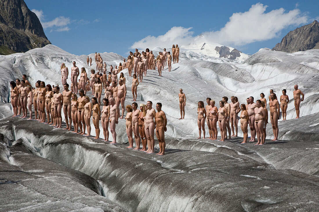 A group of naked people in front of an
