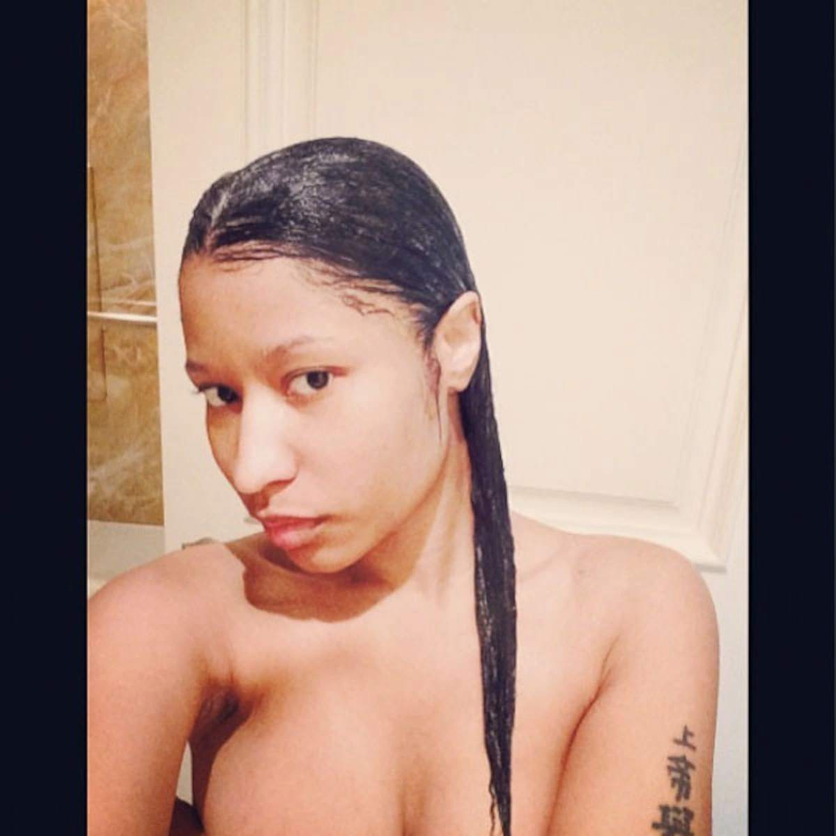 Nicki Minaj Shares Topless Selfies