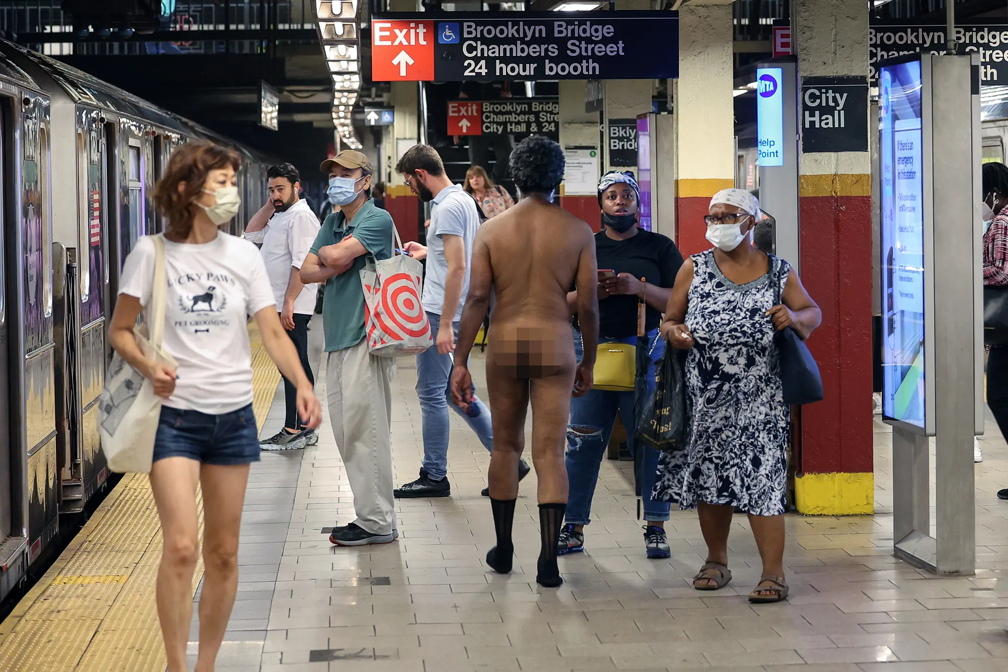 New Yorkers barely flinch as a naked man strolls through subway