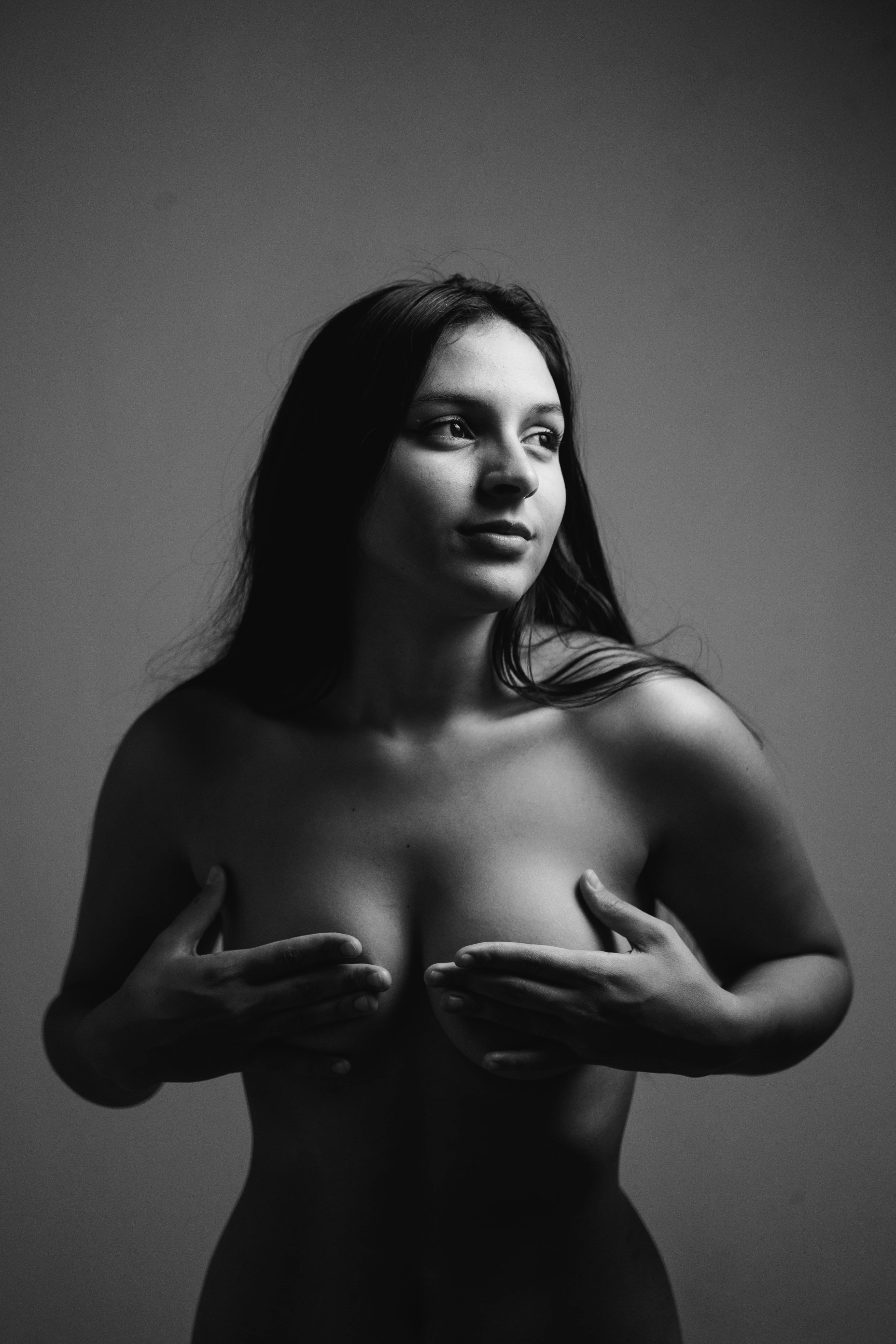 Topless Woman Covering Breasts Free Stock Photo