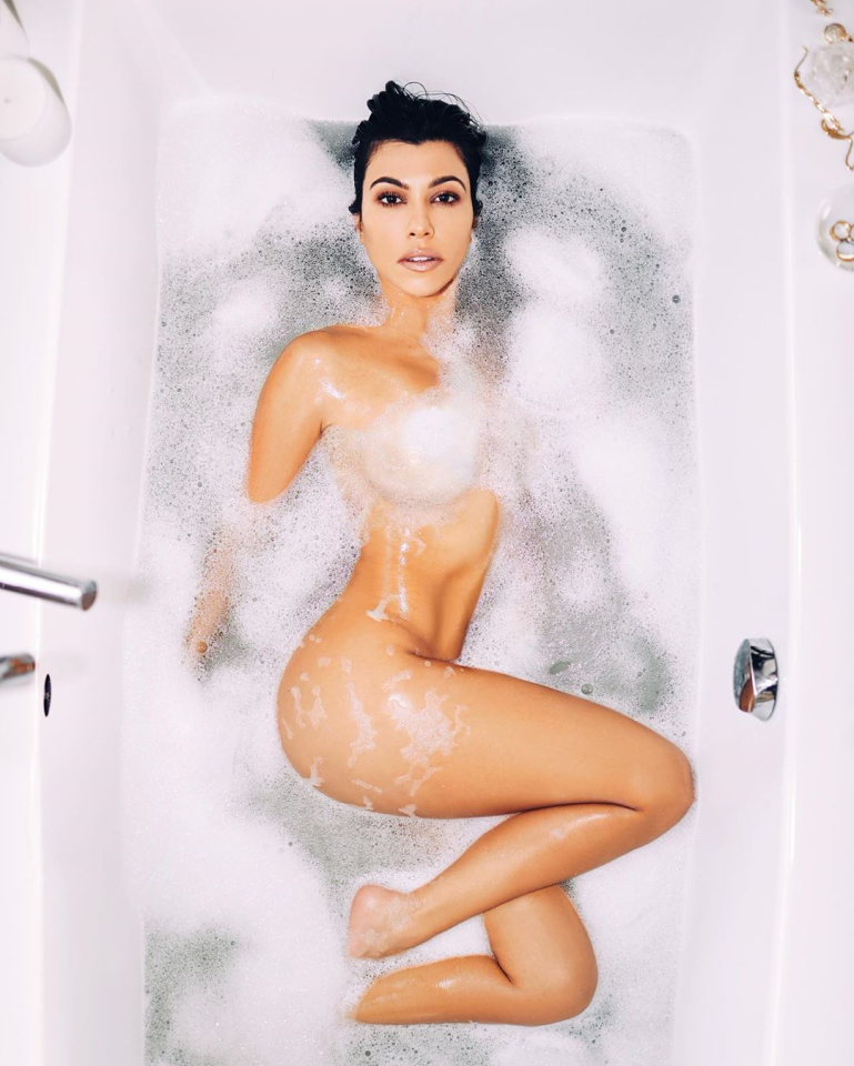 Kourtney Kardashian bares all in nude bathtub snap as fans accuse her of Photoshopping her body
