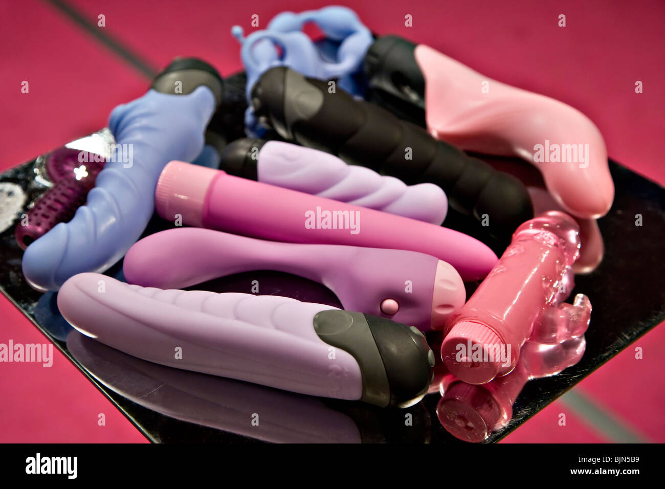 Various dildos on a table Stock Photo