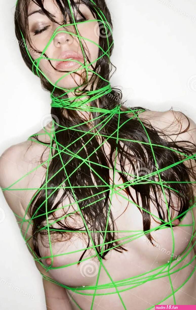 Nude Woman Bound with String. Stock Photo