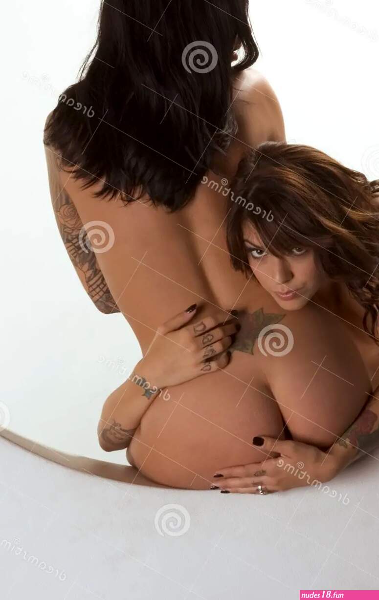Romantic Lesbian Topless Couple in Love Embrace Stock Image