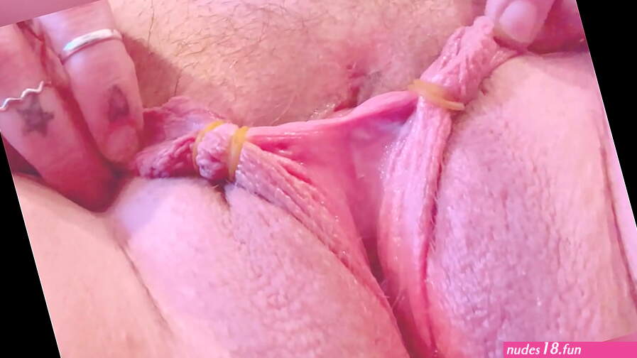 Tying rubber bands around huge pussy lips